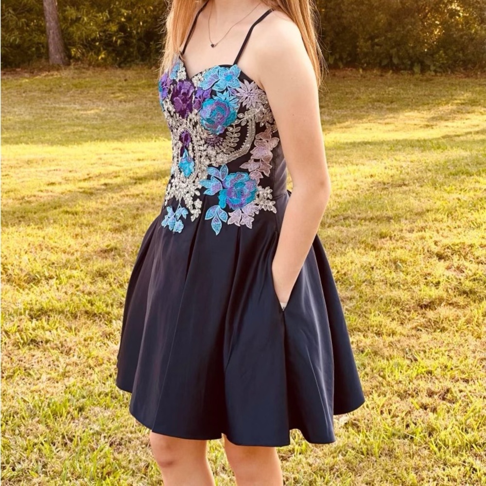 Beautiful homecoming or dance dress with removable straps was only used once!